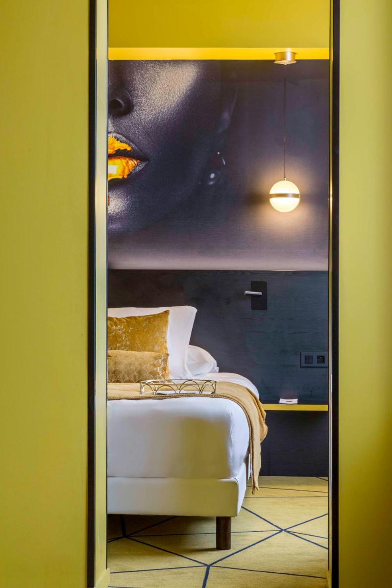 Un ou plusieurs lits dans un hébergement de l'établissement Hotel Leprince, Best Western Premier Collection