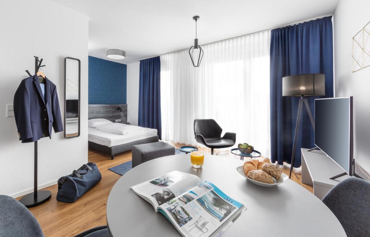 Livingroom Bad Homburg Boardinghouse - Housity