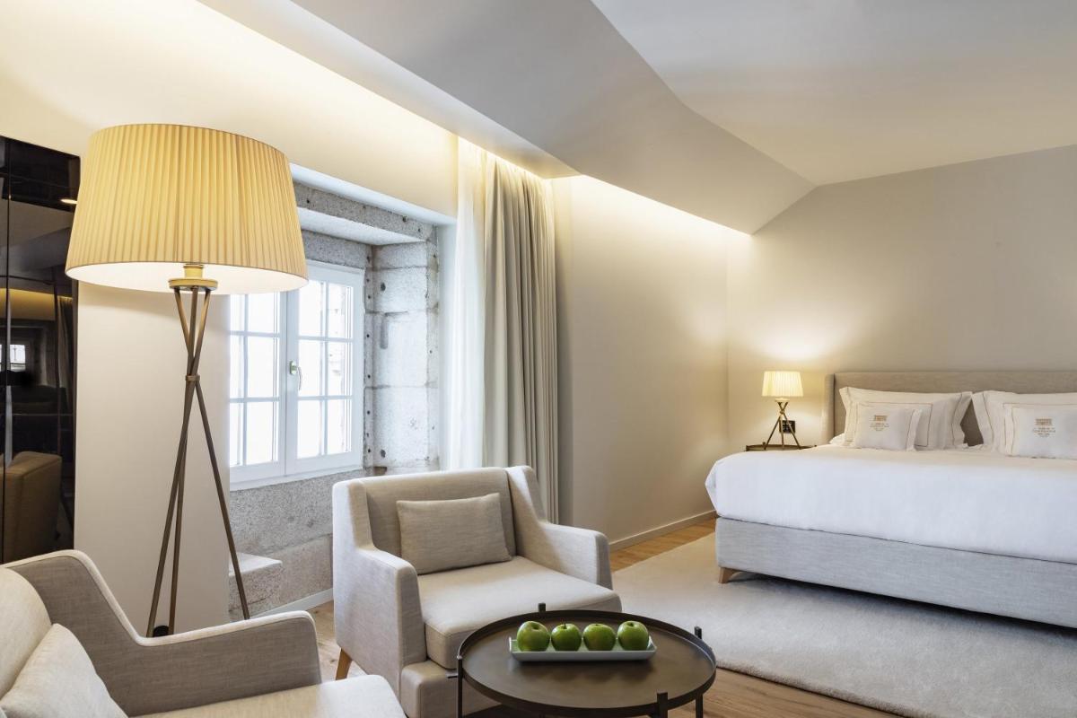 Uma cama ou camas num quarto em Casa da Companhia Hotel & Spa, Vignette Collection by IHG