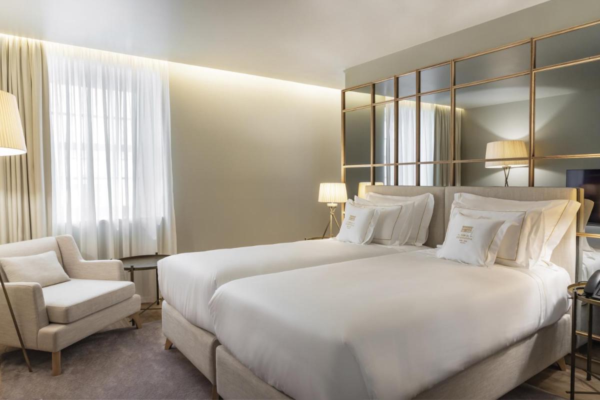 Uma cama ou camas num quarto em Casa da Companhia Hotel & Spa, Vignette Collection by IHG