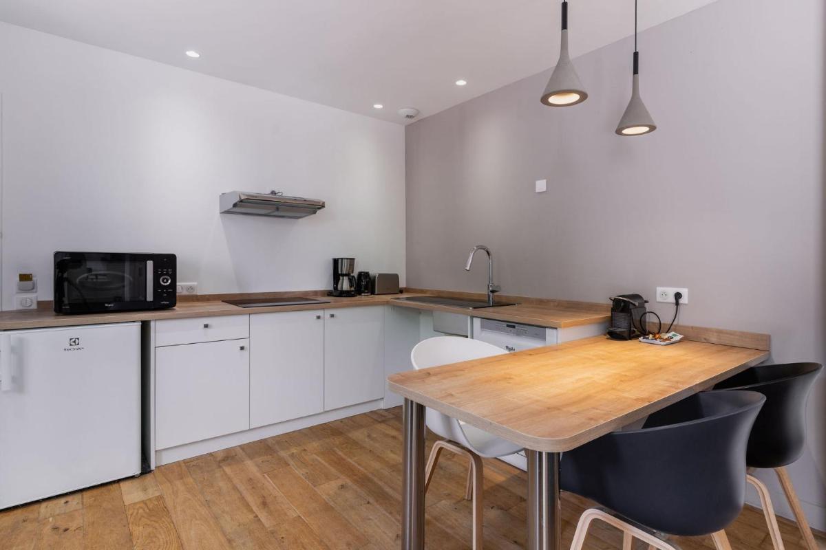 Cuisine ou kitchenette dans l'établissement Le Cornouaille Hotel & Spa