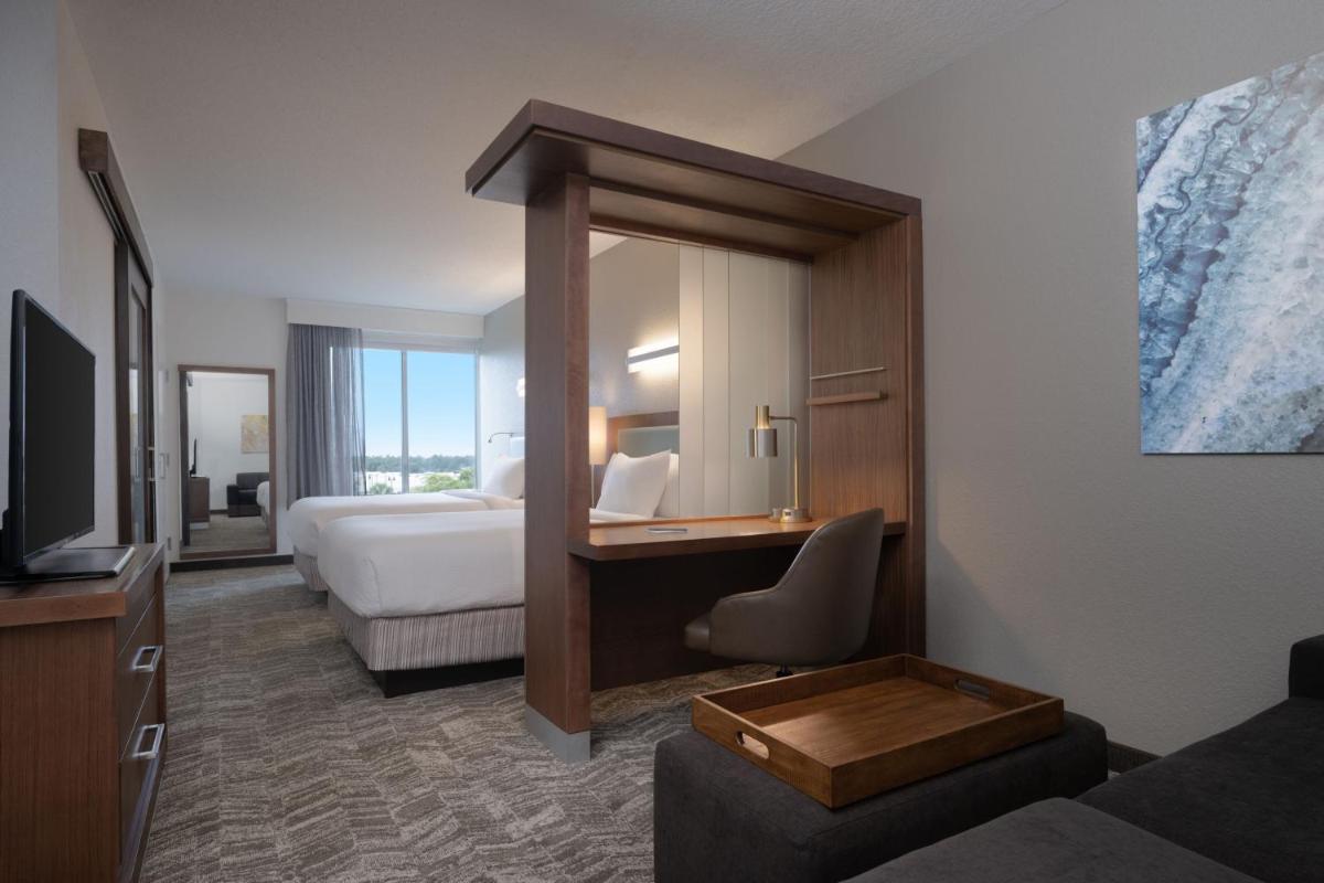 SpringHill Suites by Marriott Orlando at FLAMINGO CROSSINGS Town Center-Western Entrance - Housity