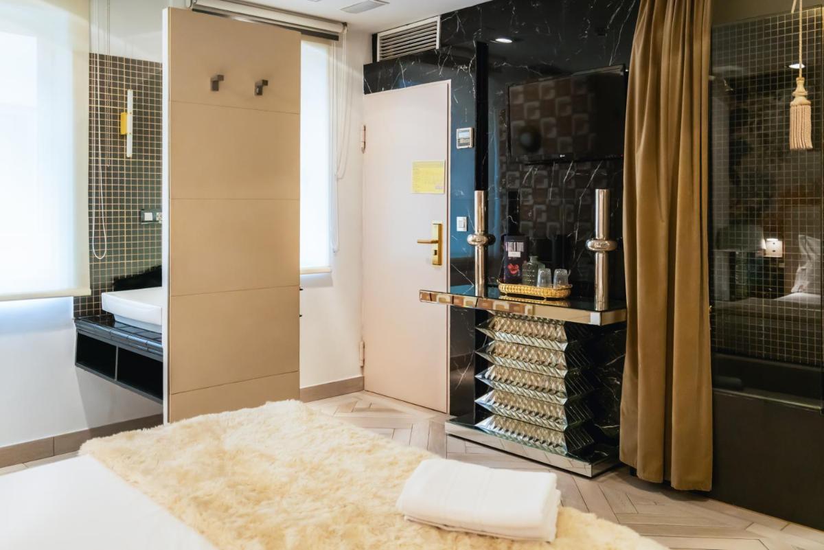 Cama o camas de una habitación en Abalú Design Boutique Hotel Gran Via