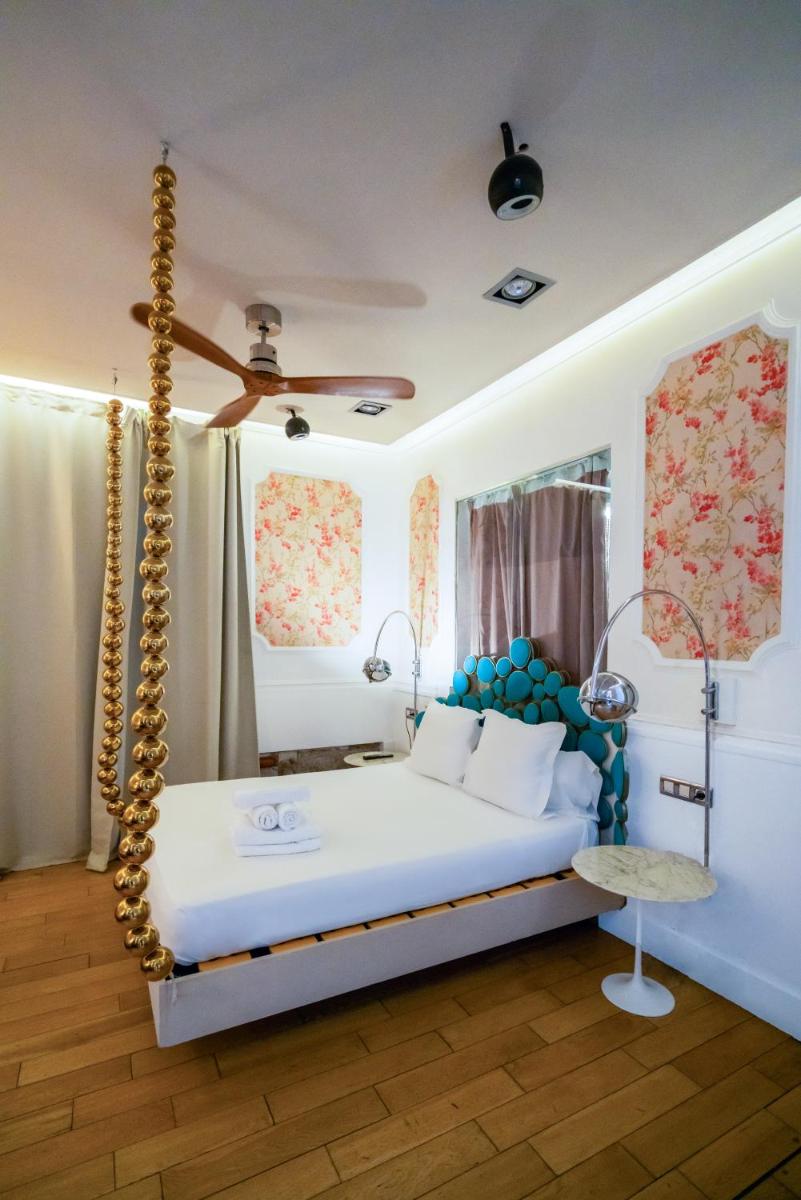Cama o camas de una habitación en Abalú Design Boutique Hotel Gran Via