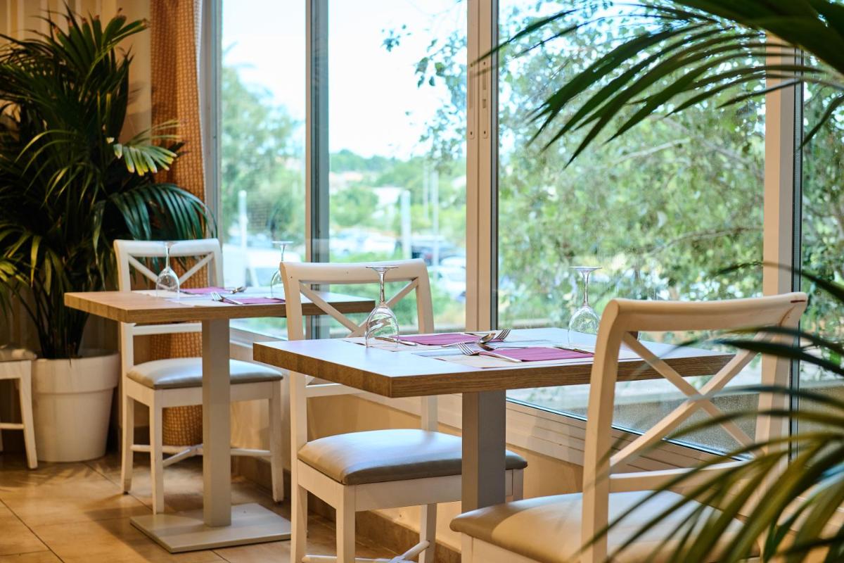 Jardín al aire libre en Grupotel Orient