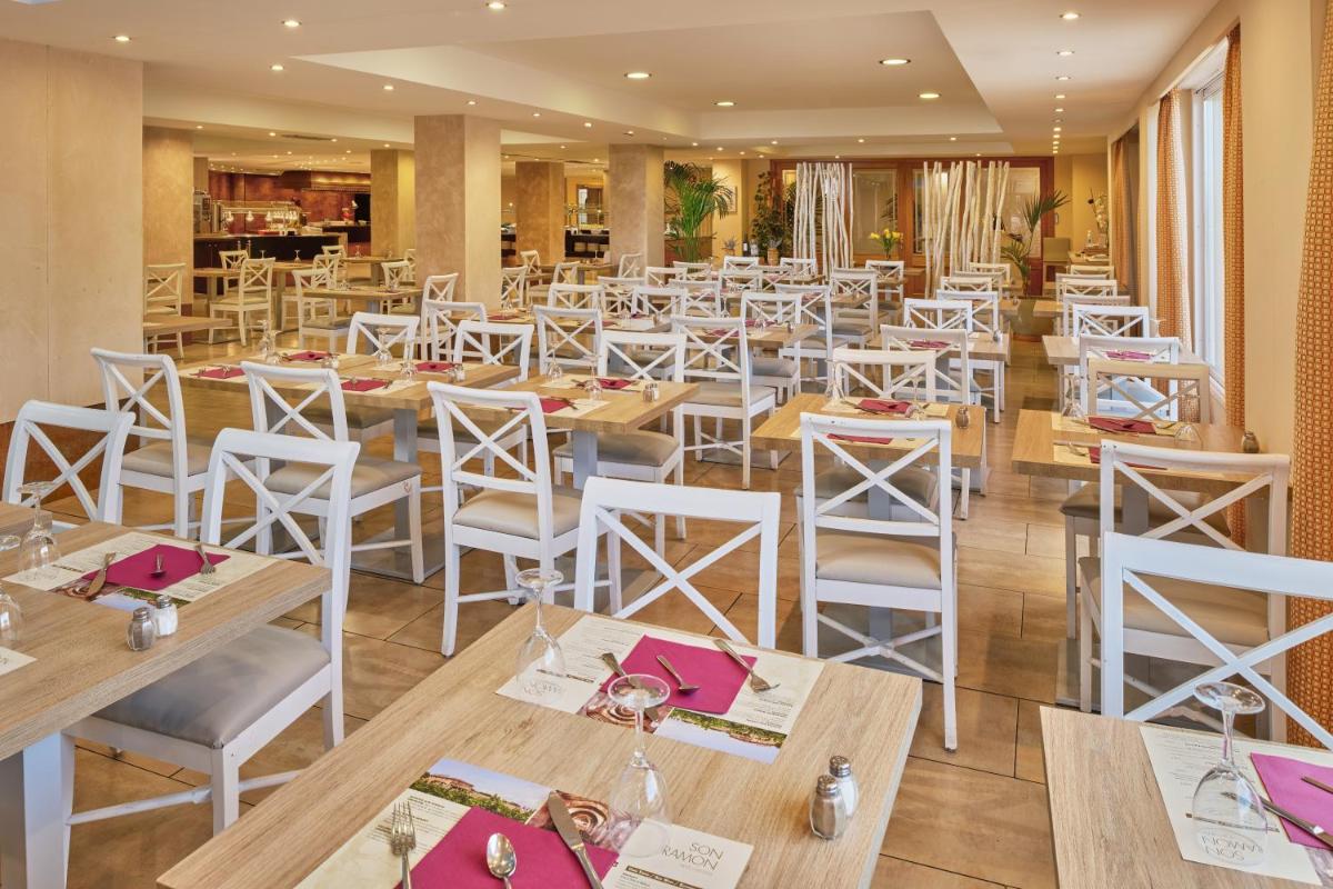 Un restaurante o sitio para comer en Grupotel Orient