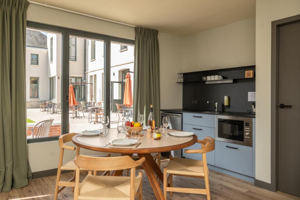 Cuisine ou kitchenette dans l'établissement La Maison Rabelais