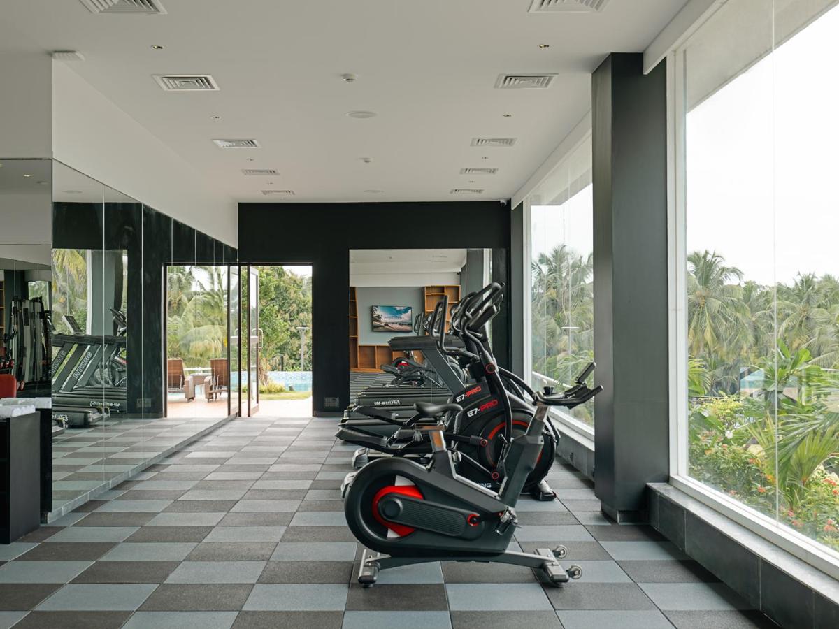 a row of exercise bikes in a fitness center at Gateway Goa, Palolem in Palolem