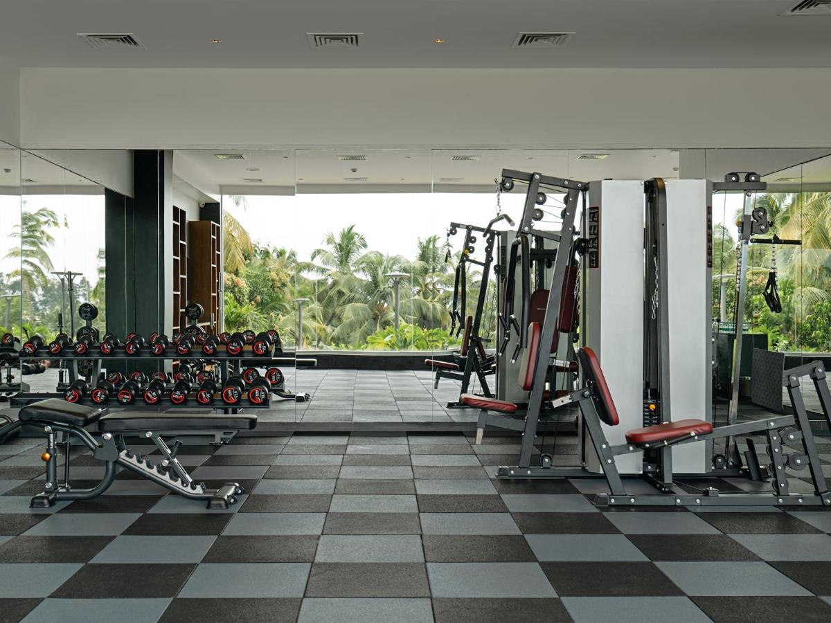 a gym with a lot of treadmills and machines at Gateway Goa, Palolem in Palolem