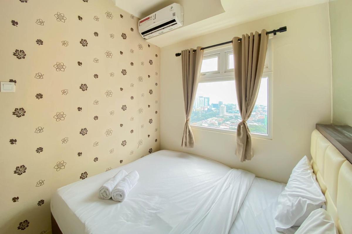 Comfortable and Strategic 2BR at Green Pramuka City Apartment By Travelio - Housity