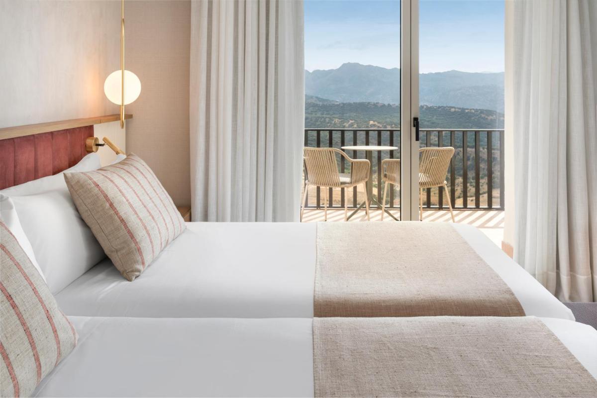 Cama o camas de una habitación en Catalonia Reina Victoria