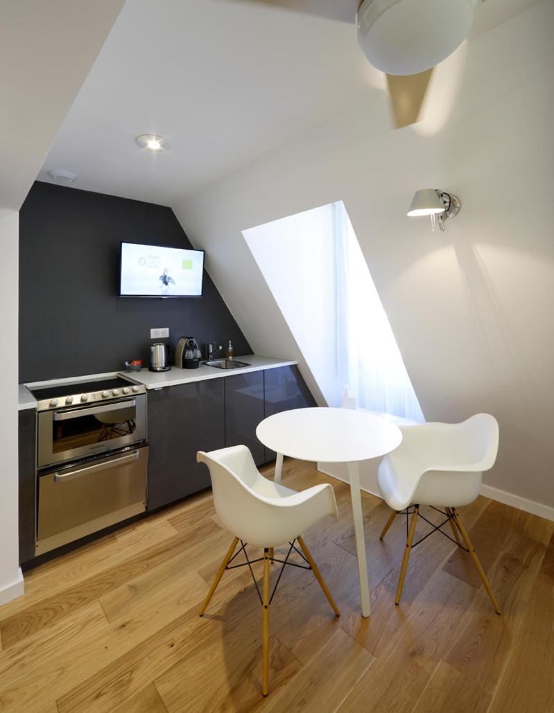 Cuisine ou kitchenette dans l'établissement Les Maisons du Pont - Charme & Caractère