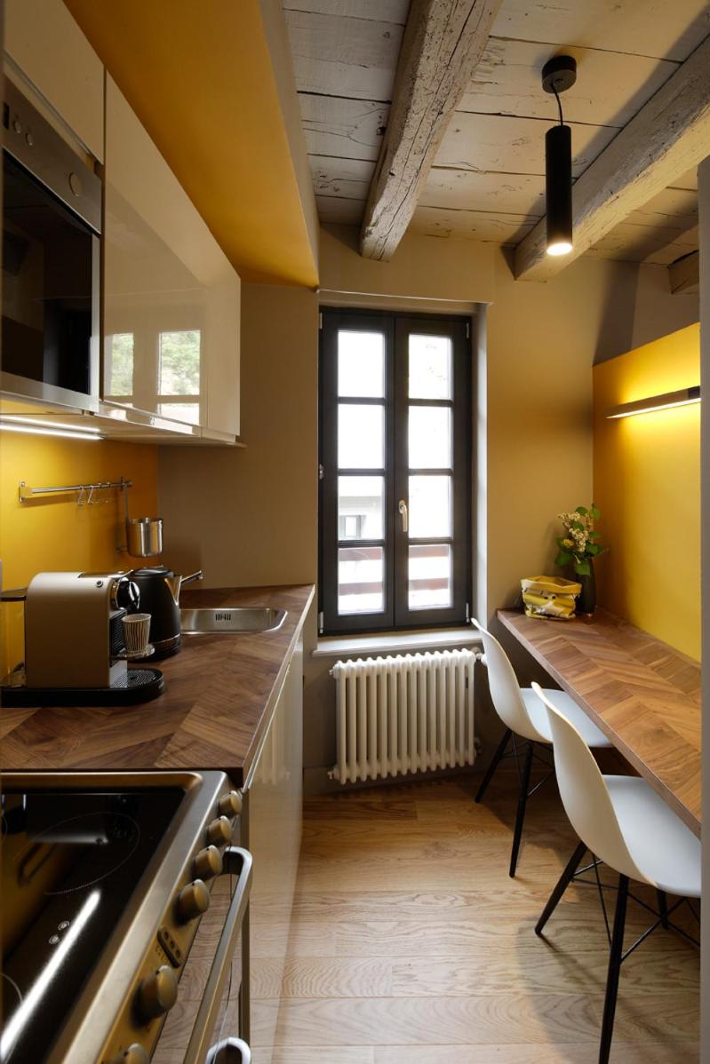 Cuisine ou kitchenette dans l'établissement Les Maisons du Pont - Charme & Caractère