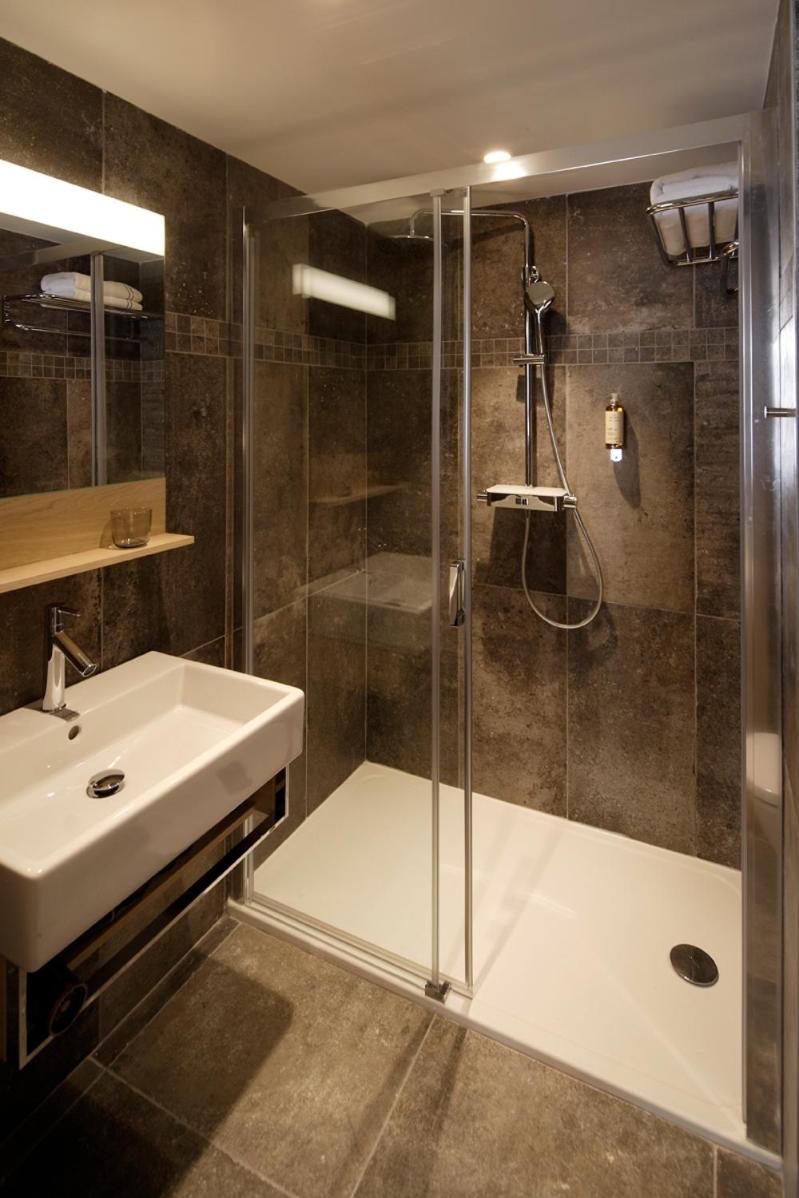 Salle de bains dans l'établissement Les Maisons du Pont - Charme & Caractère