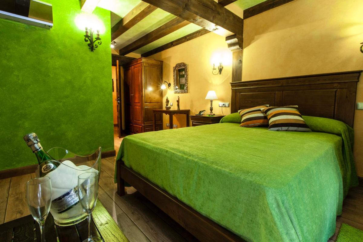 Cama o camas de una habitación en Hotel Spa Casona La Hondonada