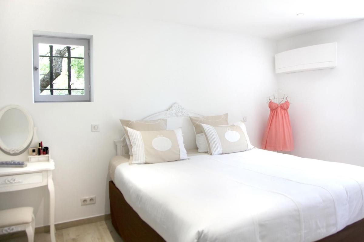 Un ou plusieurs lits dans un hébergement de l'établissement Hôtel Marinca & Spa