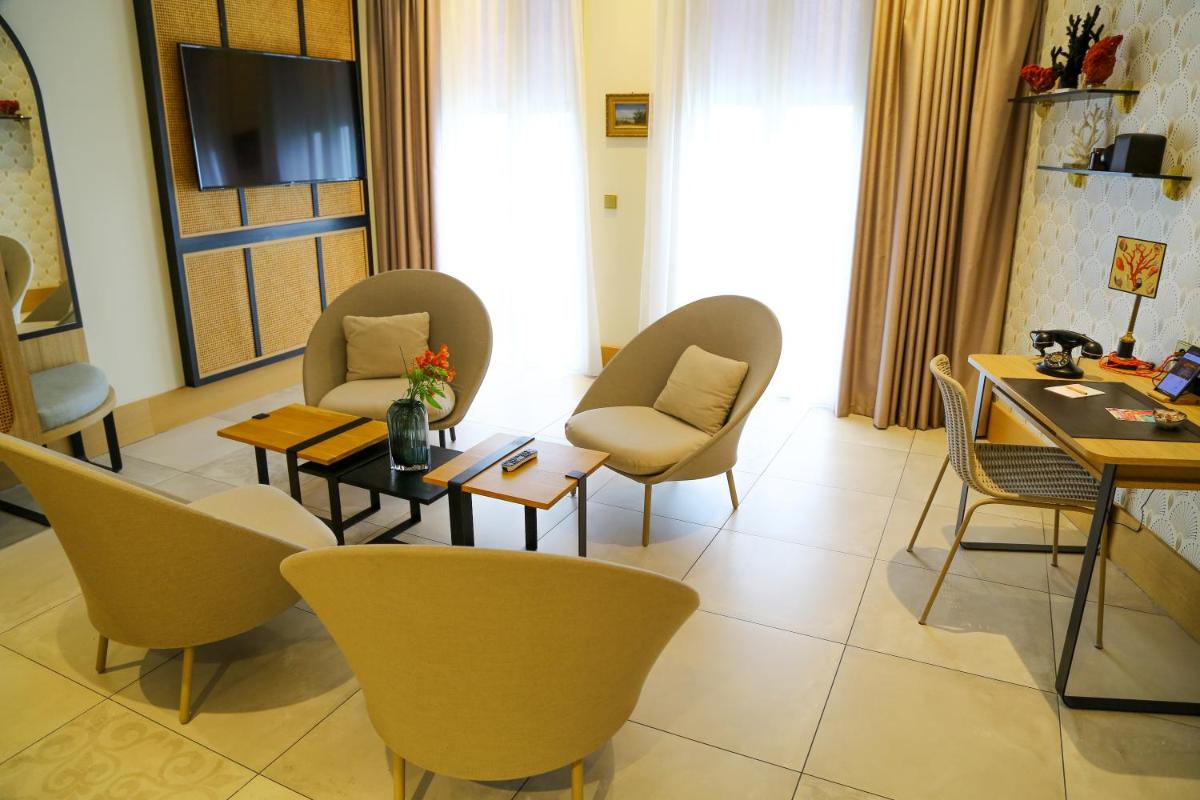 Coin salon dans l'établissement Splendid Hôtel & Spa