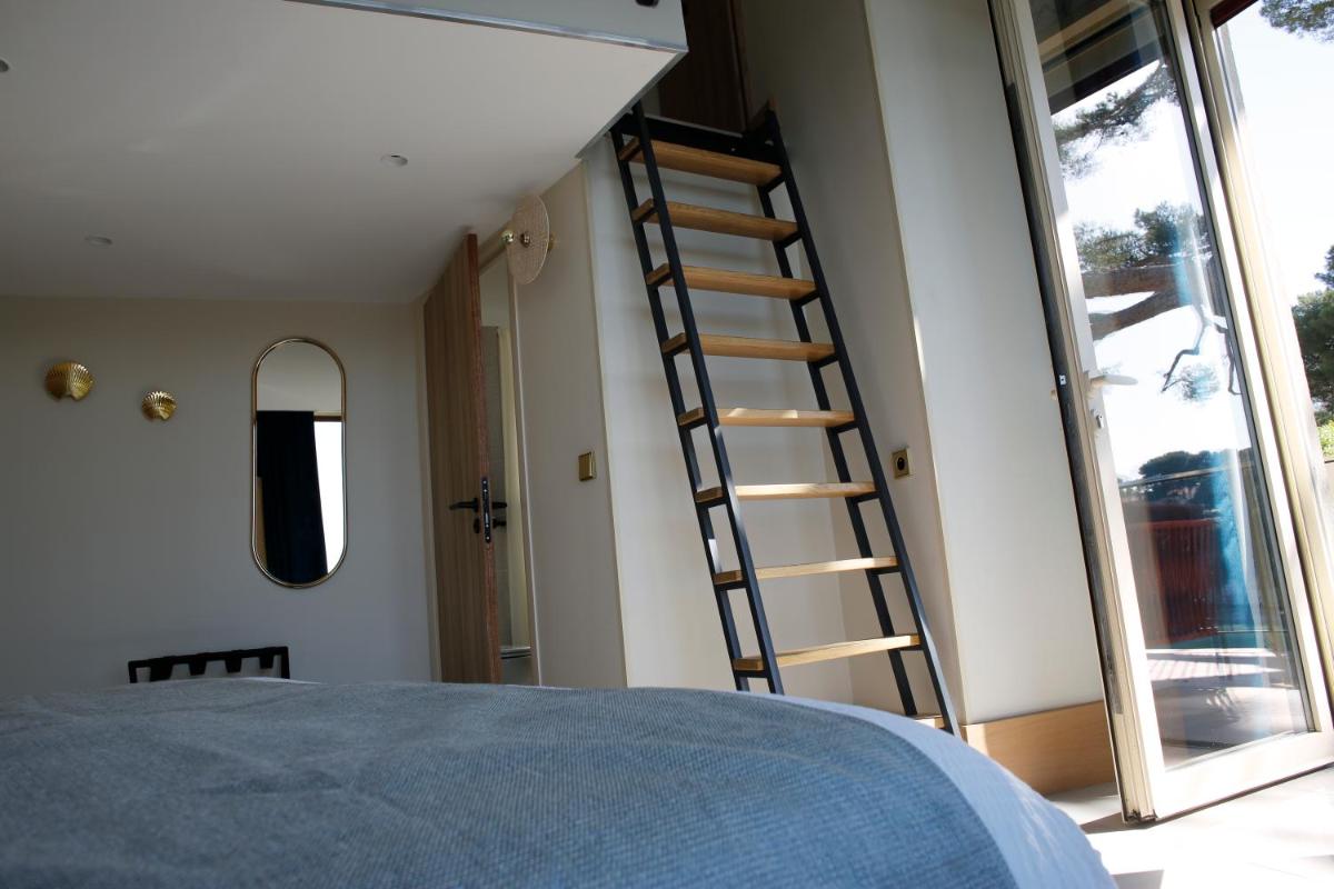 Un ou plusieurs lits dans un hébergement de l'établissement Splendid Hôtel & Spa