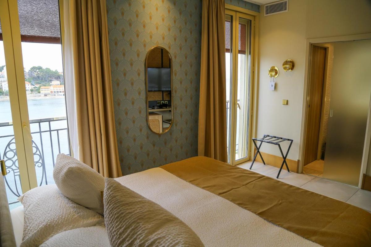 Un ou plusieurs lits dans un hébergement de l'établissement Splendid Hôtel & Spa