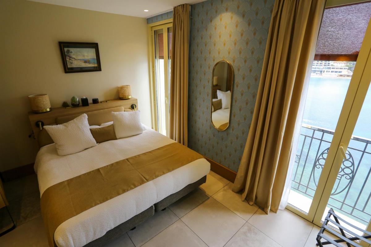 Un ou plusieurs lits dans un hébergement de l'établissement Splendid Hôtel & Spa