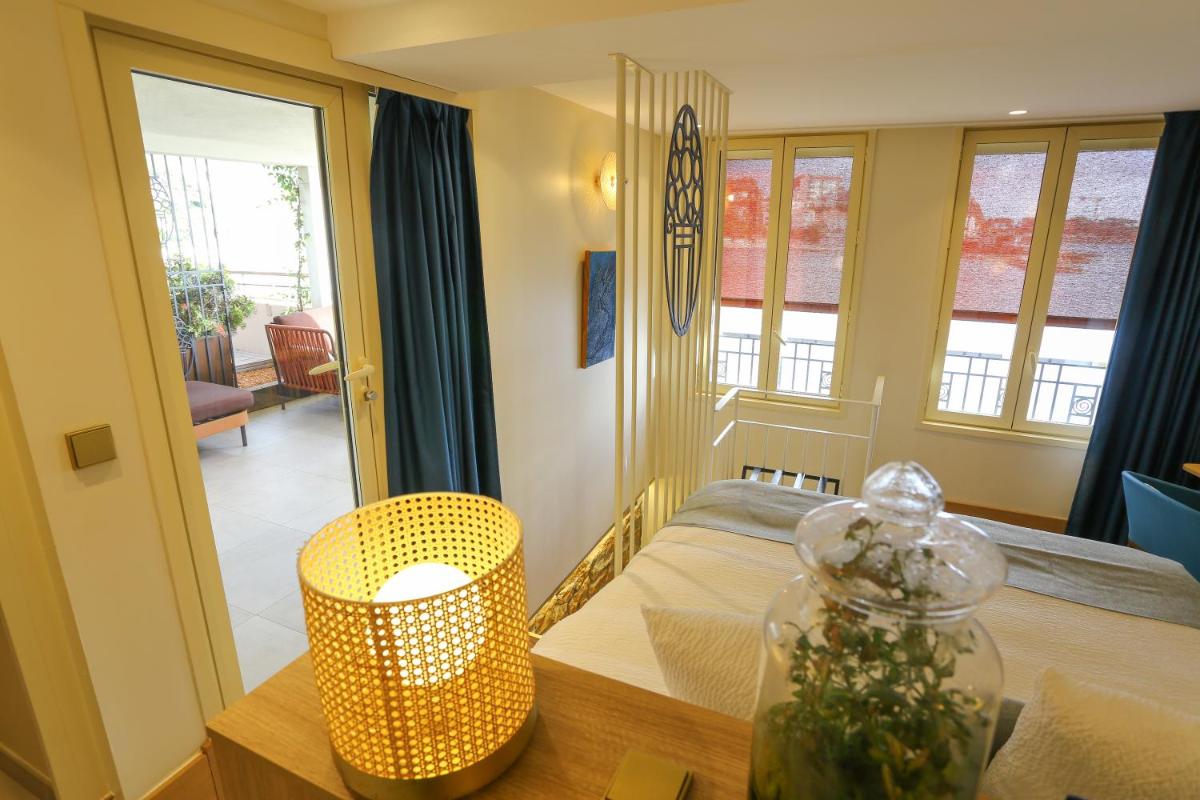 Un ou plusieurs lits dans un hébergement de l'établissement Splendid Hôtel & Spa