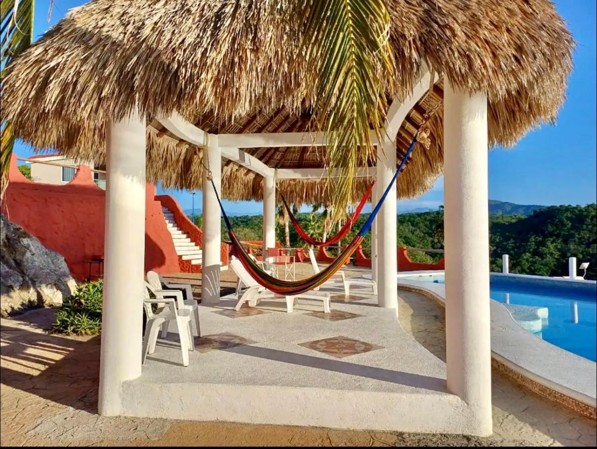 EXCLUSIVO BUNGALOW CON ALBERCA Y PLAYA SEMI-PRIVADA, PLAYA ZIPOLITE-MAZUNTE, 8 PLAYAS CERCANAS, ESPECTACULAR VISTA AL OCEANO PACÍFICO, ALBERCA INFINITA, DISFRUTA DE ESTE ACUARIO OCEÁNICO Y GOZA DIVERSOS TOURS EN MAR ABIERTO! 2 kayacs, WiFi Starlink - Housity