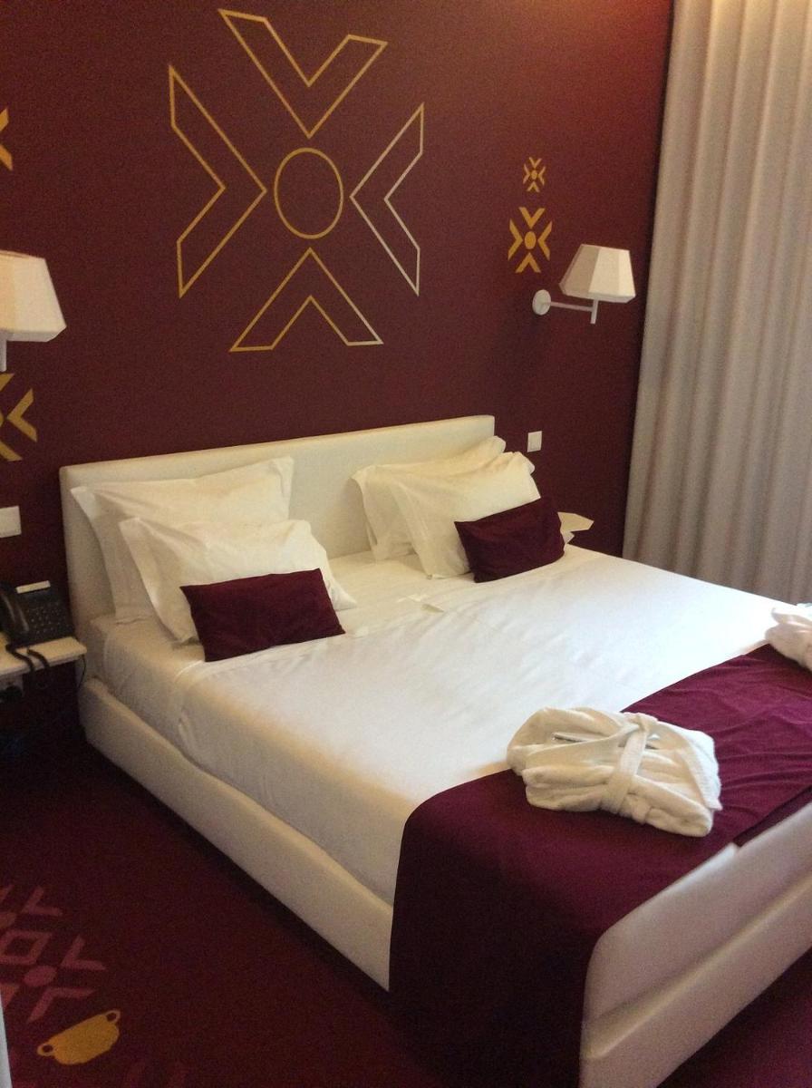 Uma cama ou camas num quarto em HD