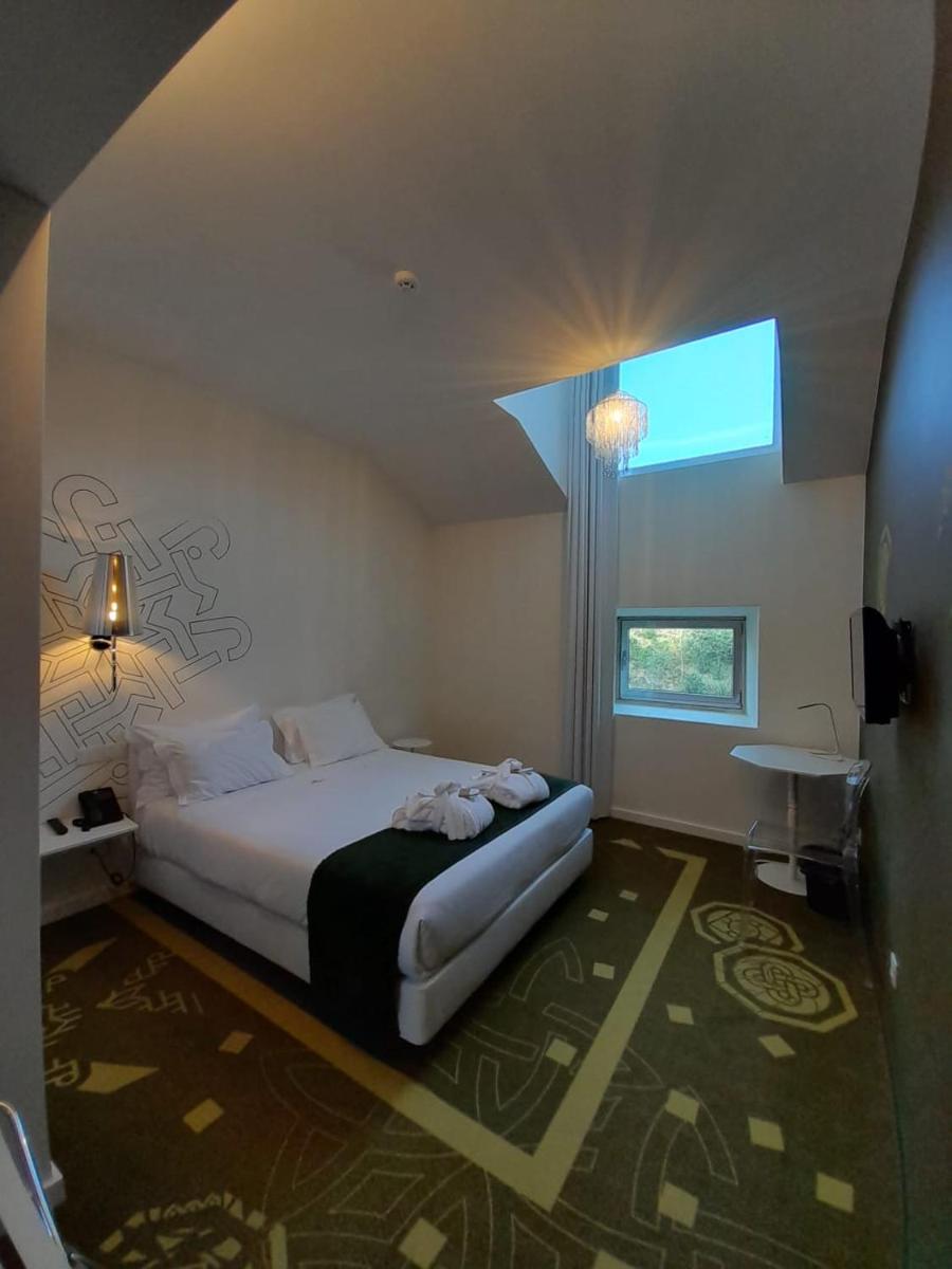 Uma cama ou camas num quarto em HD