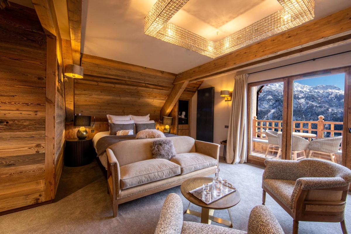 Coin salon dans l'établissement Hotel Le V de Vaujany