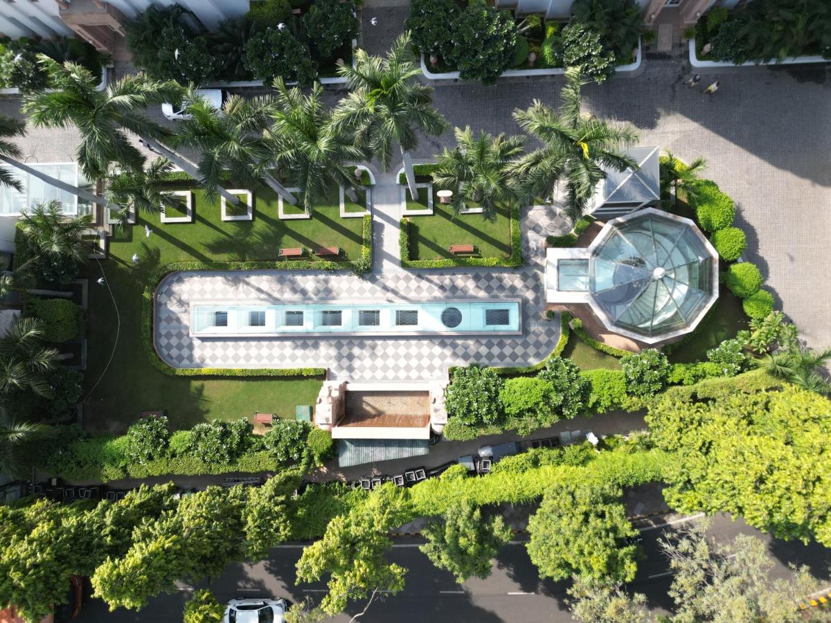 an overhead view of a building with a pool and trees at The Imperial, New Delhi in New Delhi an overhead view of a building with a pool and trees at The Imperial, New Delhi in New Delhi