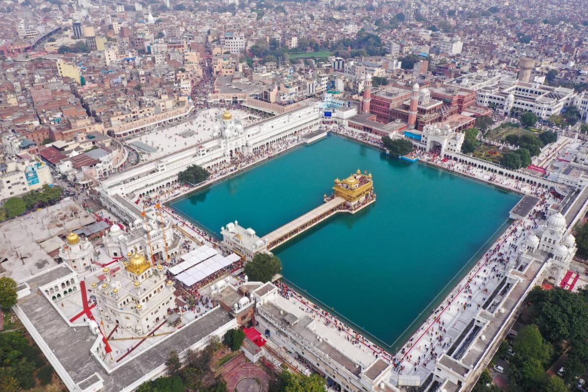 an aerial view of a large artificial lake at Courtyard by Marriott Amritsar in Amritsar