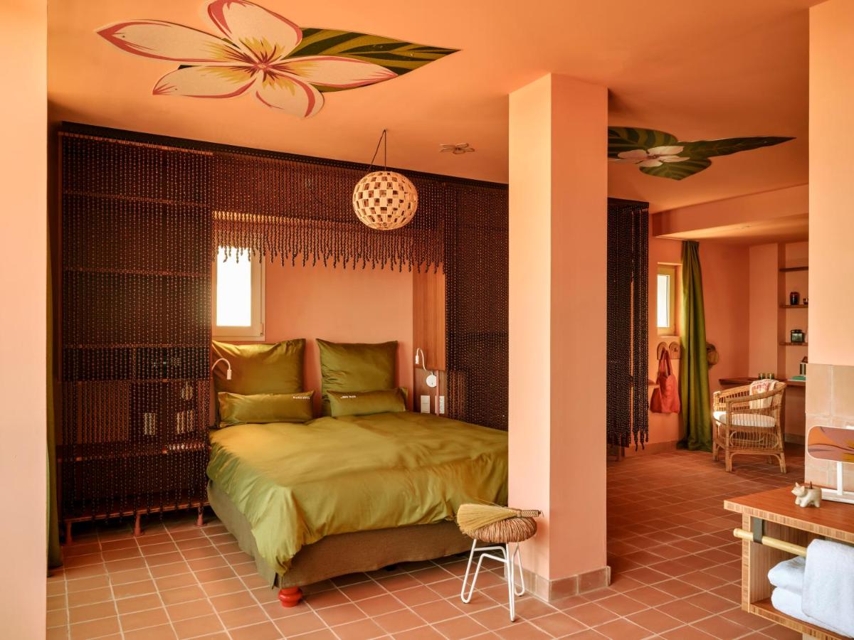 Cama o camas de una habitación en Bikini Island & Mountain Hotel Es Trenc -Adults only-