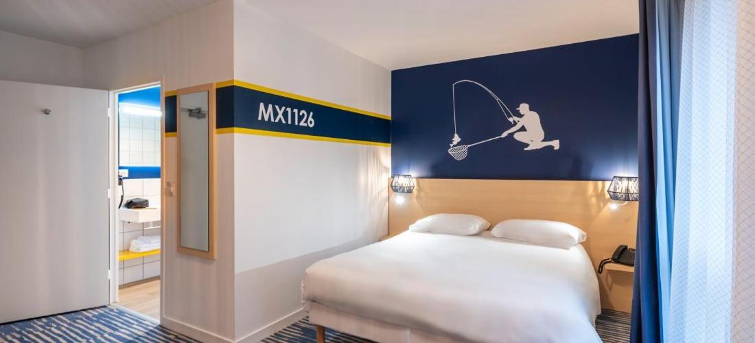 Un ou plusieurs lits dans un hébergement de l'établissement ibis Styles Morlaix