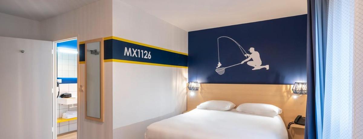 Un ou plusieurs lits dans un hébergement de l'établissement ibis Styles Morlaix