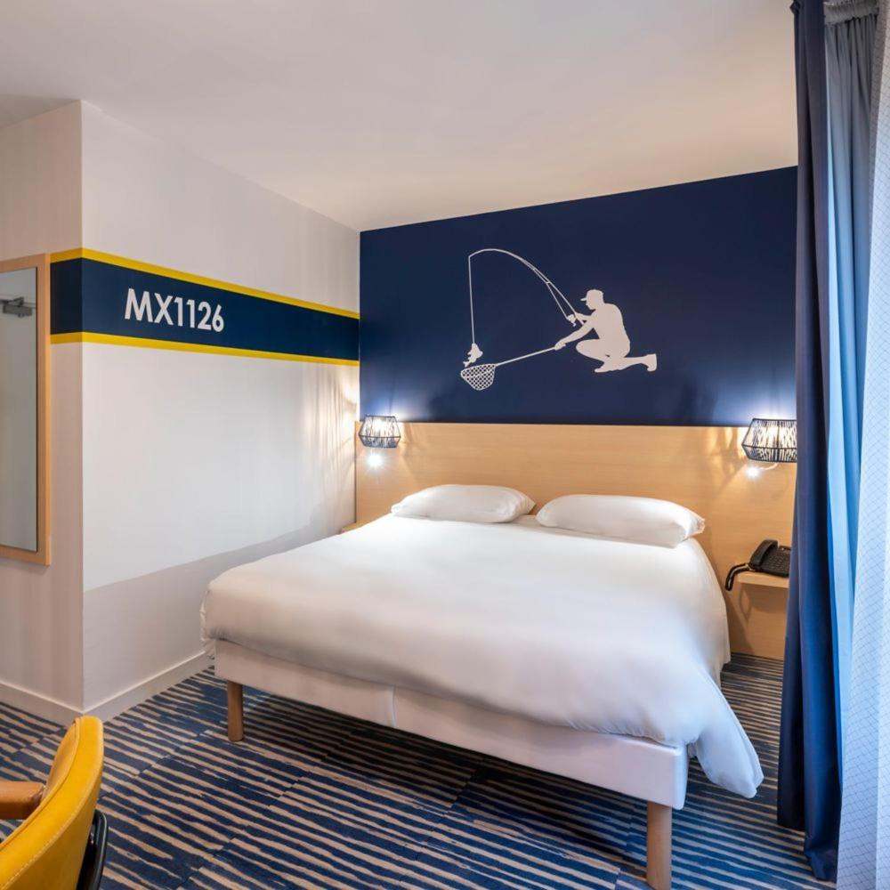 Un ou plusieurs lits dans un hébergement de l'établissement ibis Styles Morlaix
