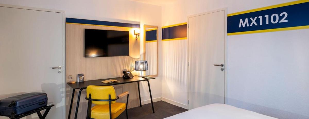 Un ou plusieurs lits dans un hébergement de l'établissement ibis Styles Morlaix