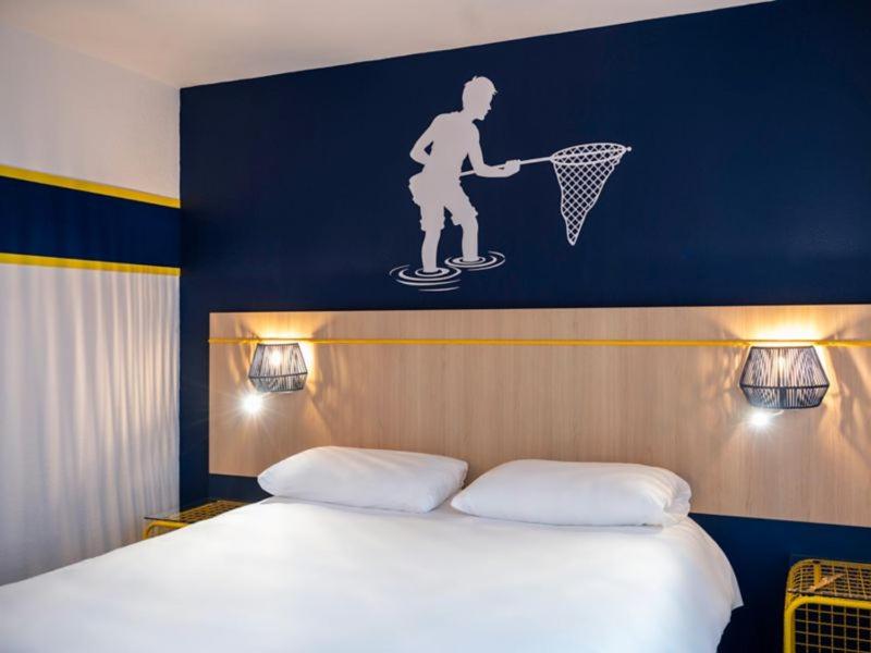 Un ou plusieurs lits dans un hébergement de l'établissement ibis Styles Morlaix