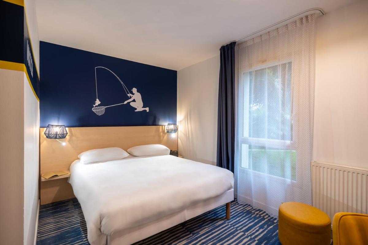 Un ou plusieurs lits dans un hébergement de l'établissement ibis Styles Morlaix
