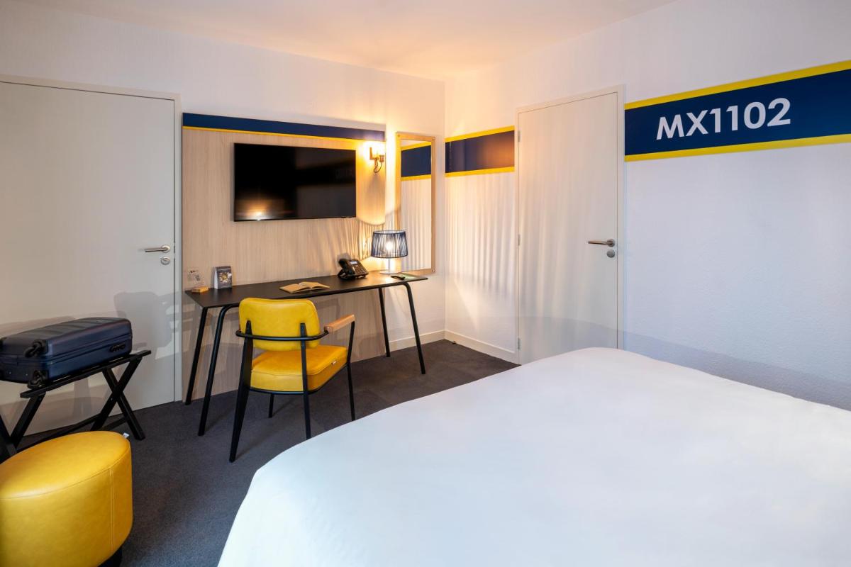 Un ou plusieurs lits dans un hébergement de l'établissement ibis Styles Morlaix