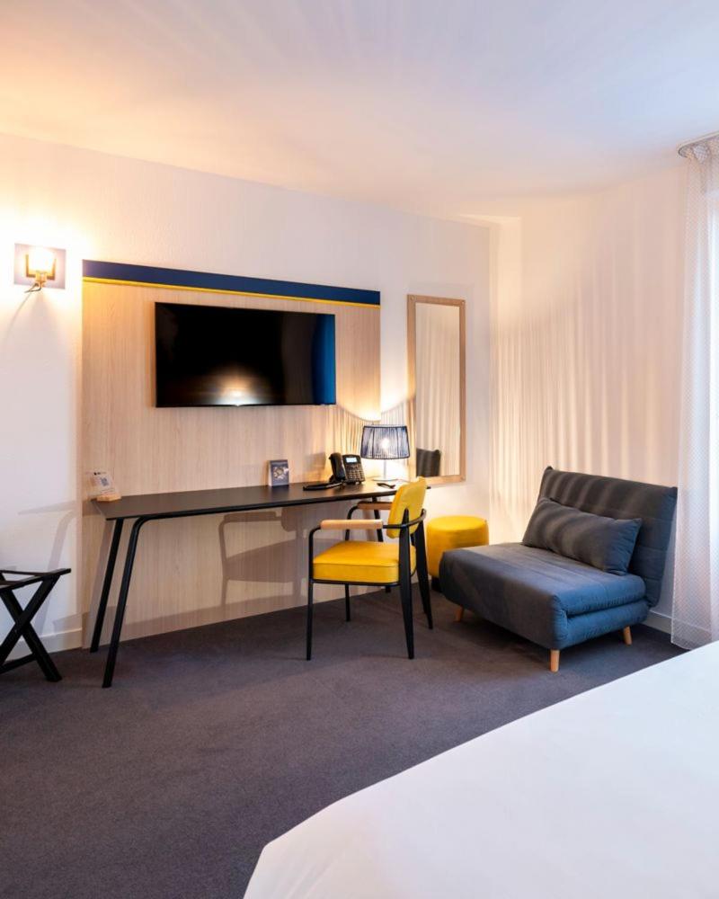 Télévision ou salle de divertissement dans l'établissement ibis Styles Morlaix