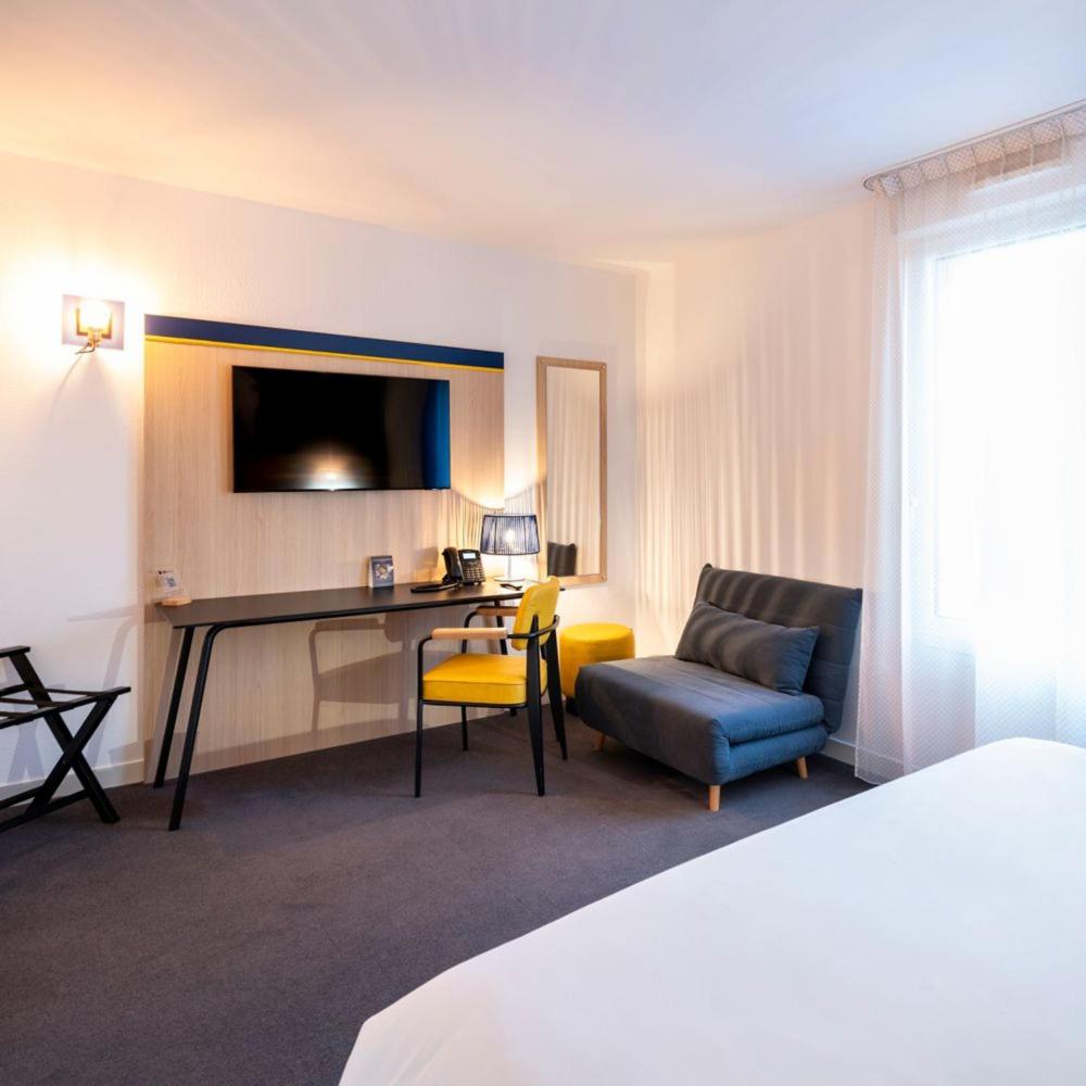 Télévision ou salle de divertissement dans l'établissement ibis Styles Morlaix