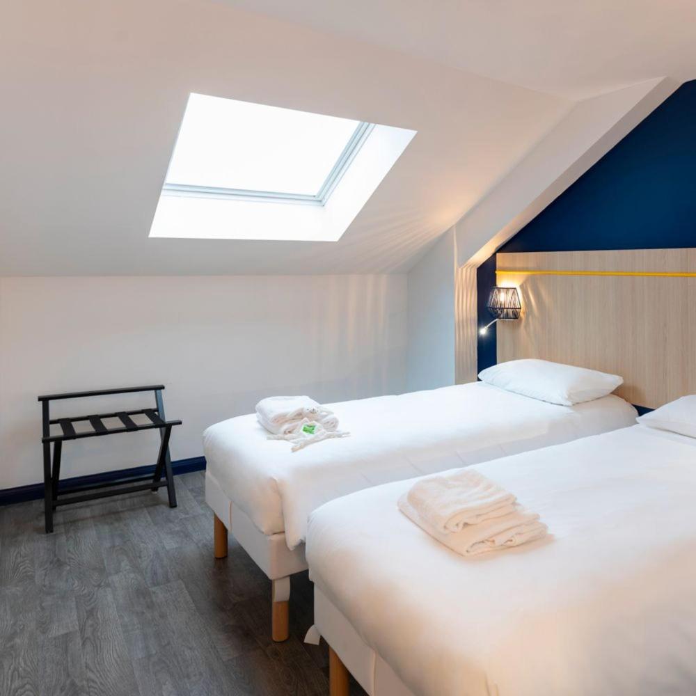 Un ou plusieurs lits dans un hébergement de l'établissement ibis Styles Morlaix