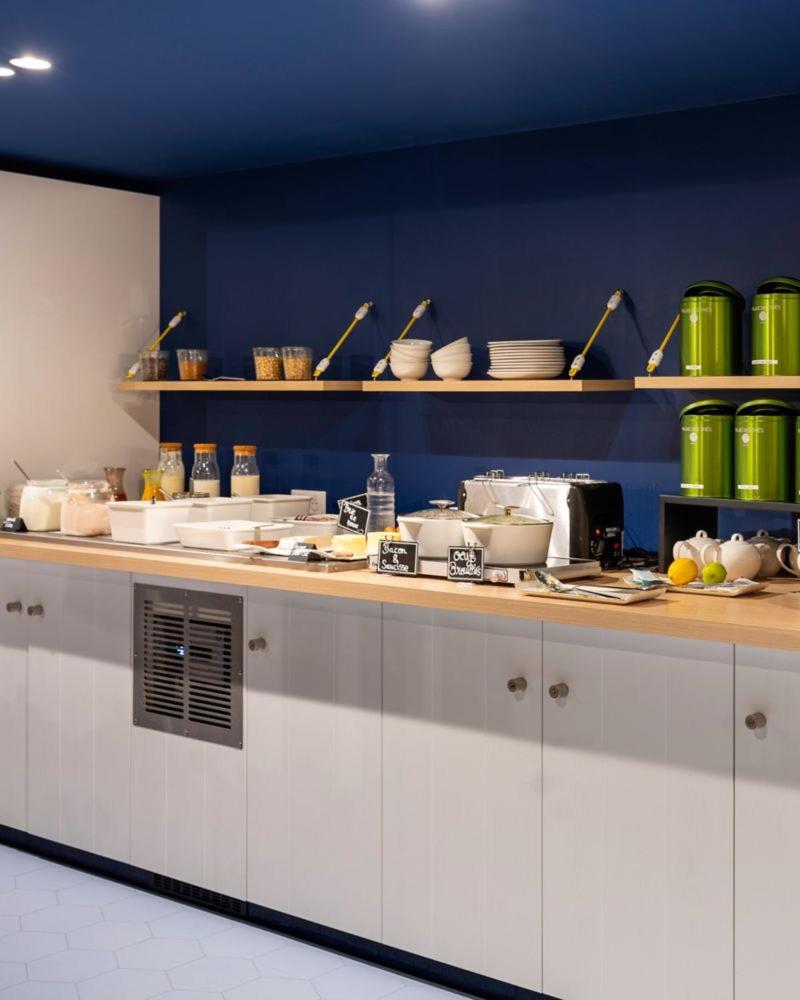 Cuisine ou kitchenette dans l'établissement ibis Styles Morlaix