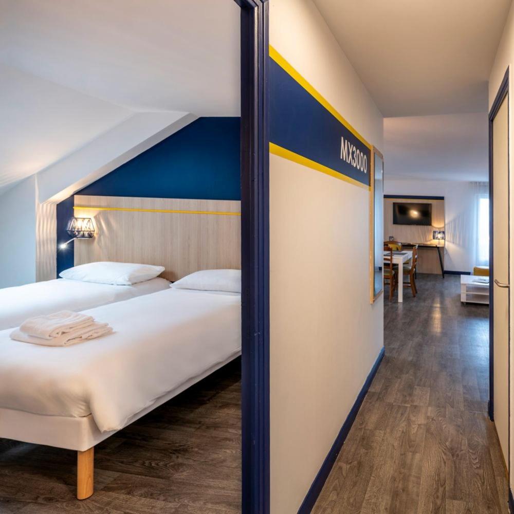 Un ou plusieurs lits dans un hébergement de l'établissement ibis Styles Morlaix