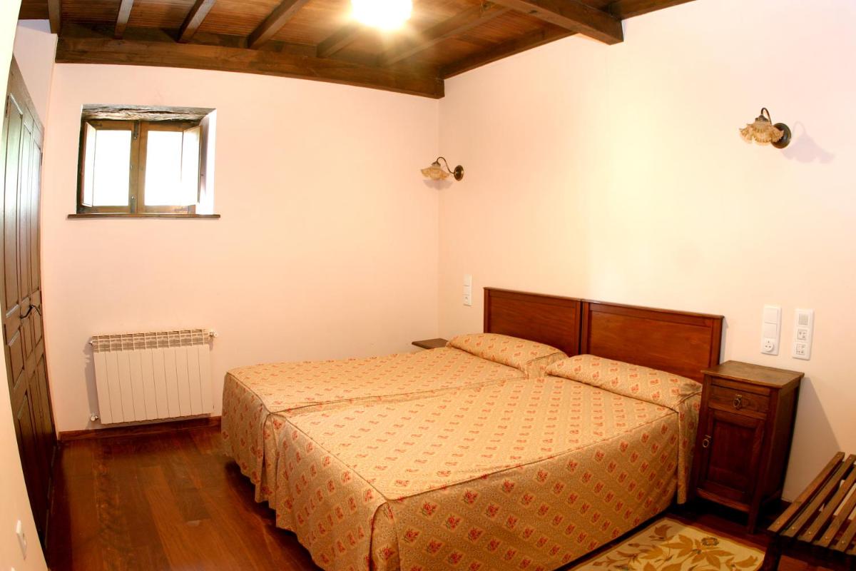 Cama o camas de una habitación en Hotel Monumento Pazo do Castro