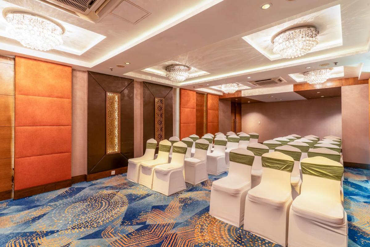 a conference room with rows of chairs in it at Pride Plaza Hotel, Kolkata in Kolkata