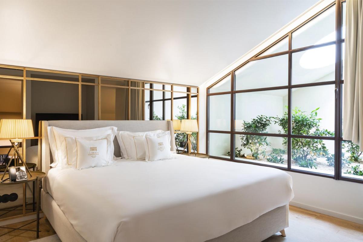 Uma cama ou camas num quarto em Casa da Companhia Hotel & Spa, Vignette Collection by IHG
