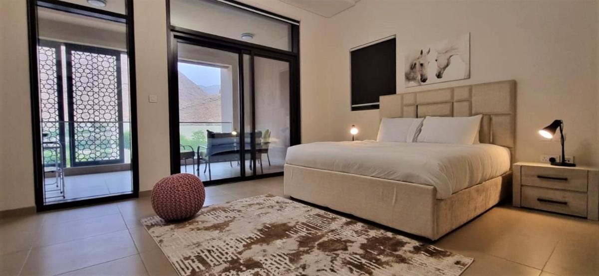 ONE Elegant 2BHK Apartment in Muscat Bay - Housity