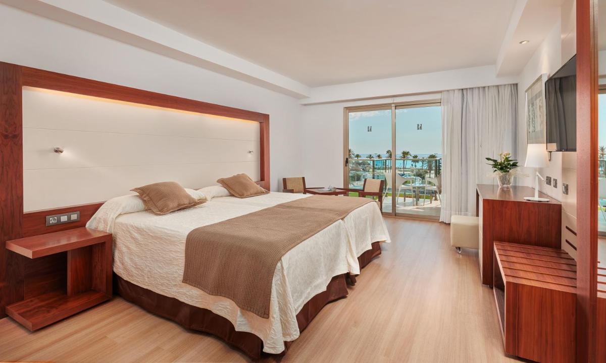 Cama o camas de una habitación en Hipotels Cala Millor Park