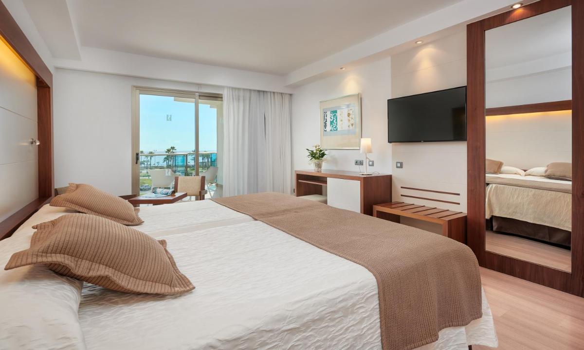 Cama o camas de una habitación en Hipotels Cala Millor Park